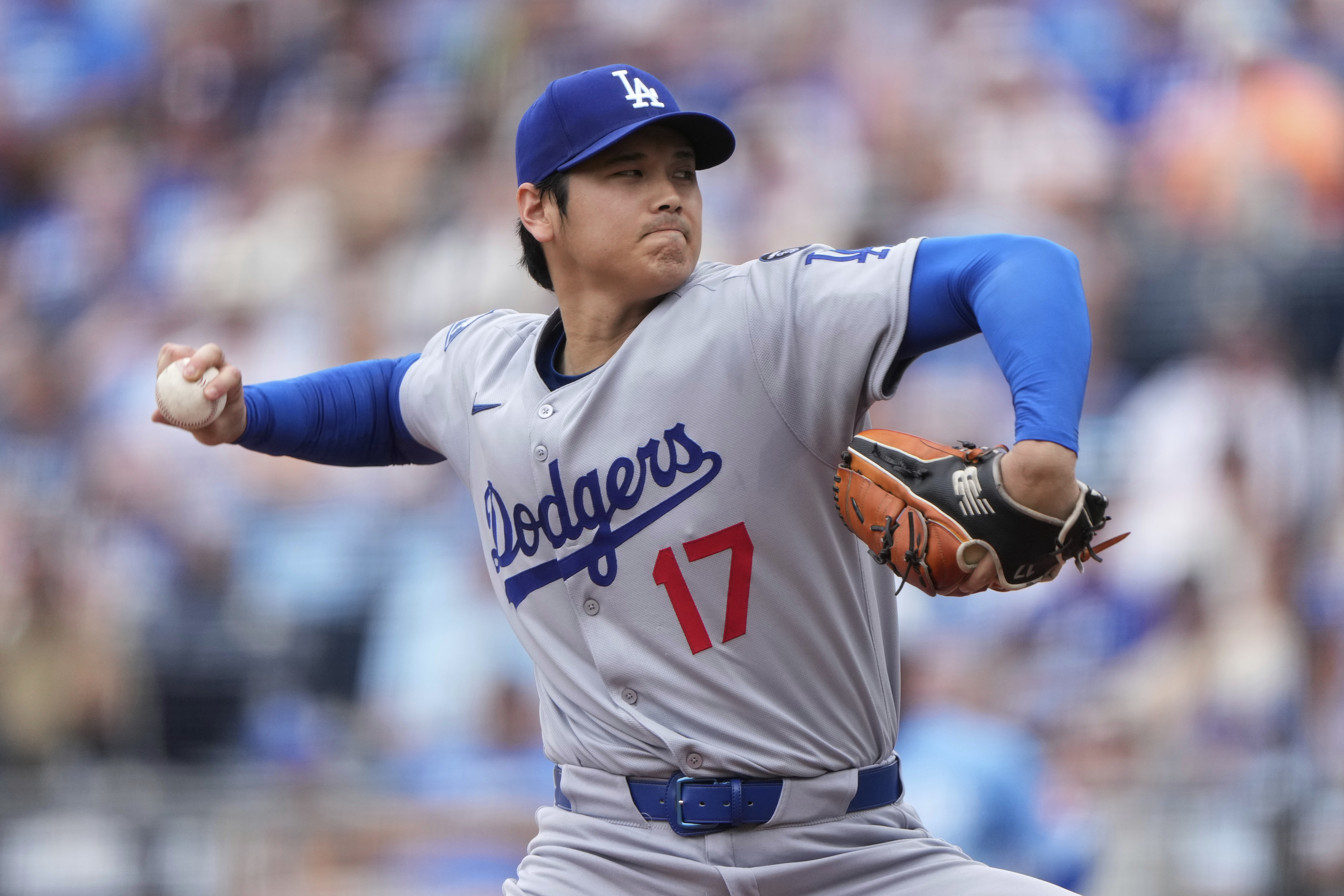 Los Angeles Dodgers starting pitcher Shohei Ohtani throws during the first inning of a baseball game against the Kansas City Royals, Saturday, June 28, 2025, in Kansas City, Mo. 