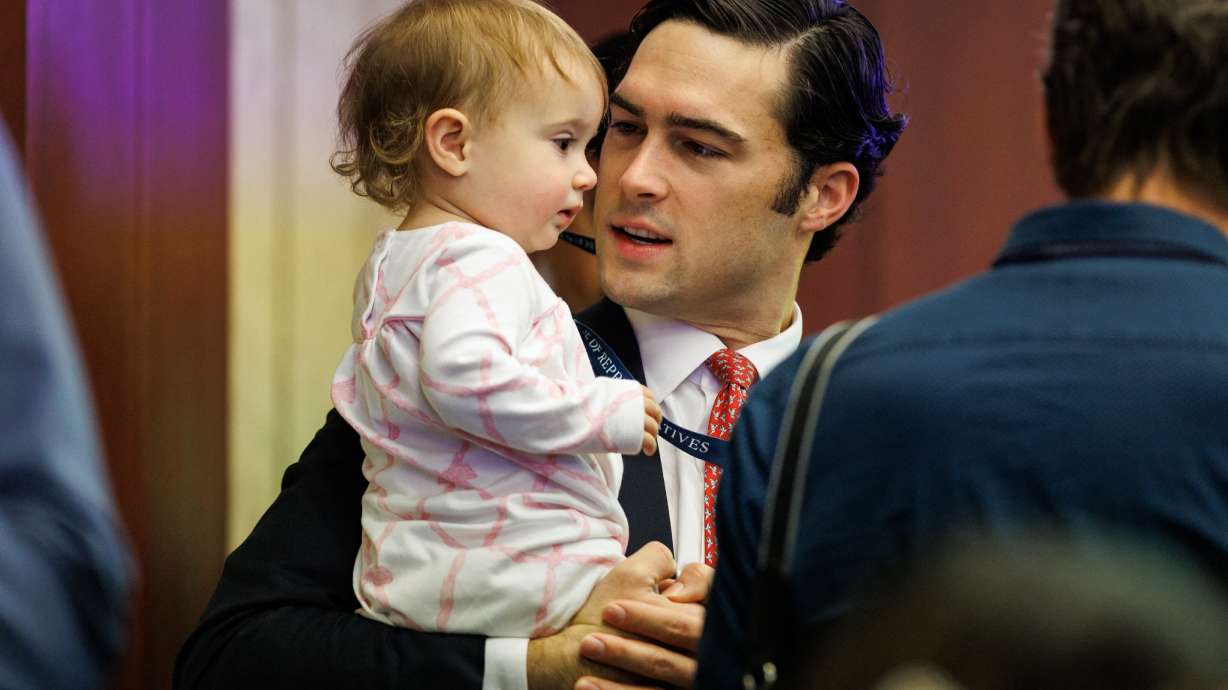 U.S. Rep.-elect Brandon Gill, R-Texas, holds his 16-month-old daughter, Marigold, during the member-elect room lottery drawing, hosted by the House Administration Committee on Capitol Hill in Washington on Nov. 21, 2024.