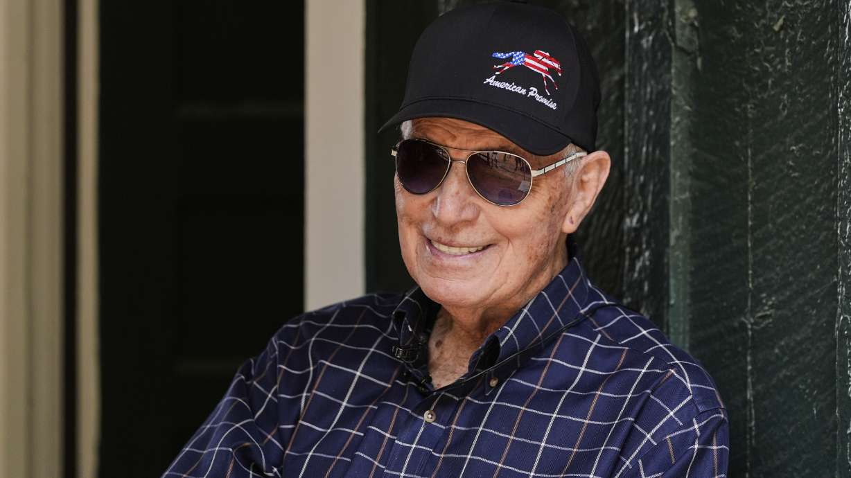 FILE - Trainer D. Wayne Lukas talks to media after arriving at Pimlico Race Course in Baltimore, with Preakness Stakes entrant American Promise, May 12, 2025.