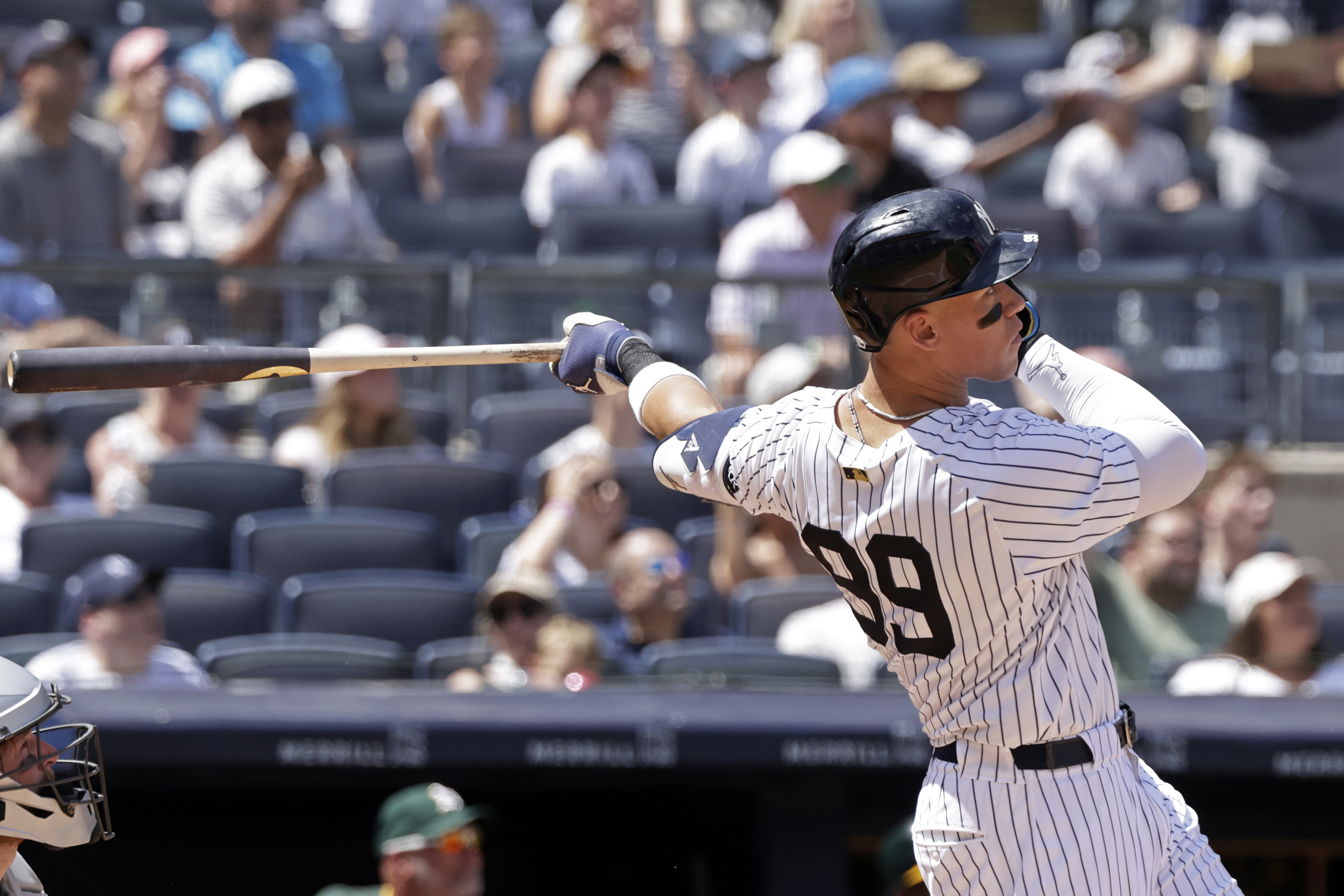 New York Yankees' Aaron Judge hits a two-run home run during the fourth inning of a baseball game against the Athletics, Sunday, June 29, 2025, in New York. 