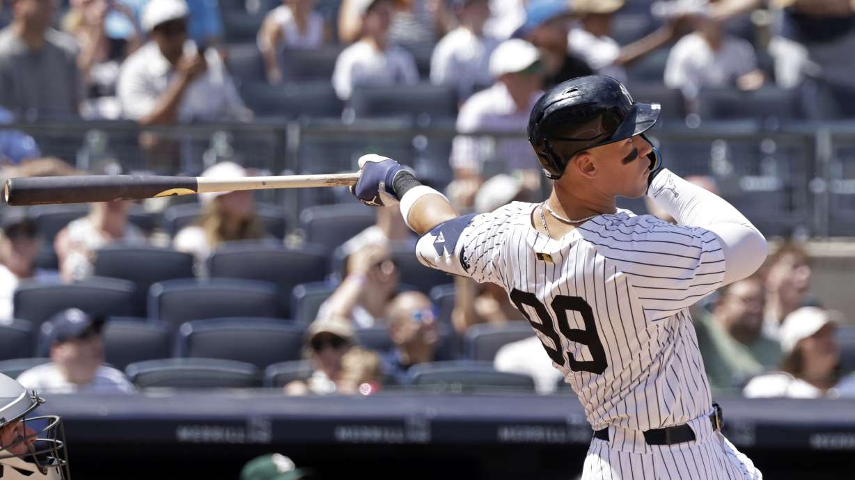 New York Yankees' Aaron Judge hits a two-run home run during the fourth inning of a baseball game against the Athletics, Sunday, June 29, 2025, in New York.