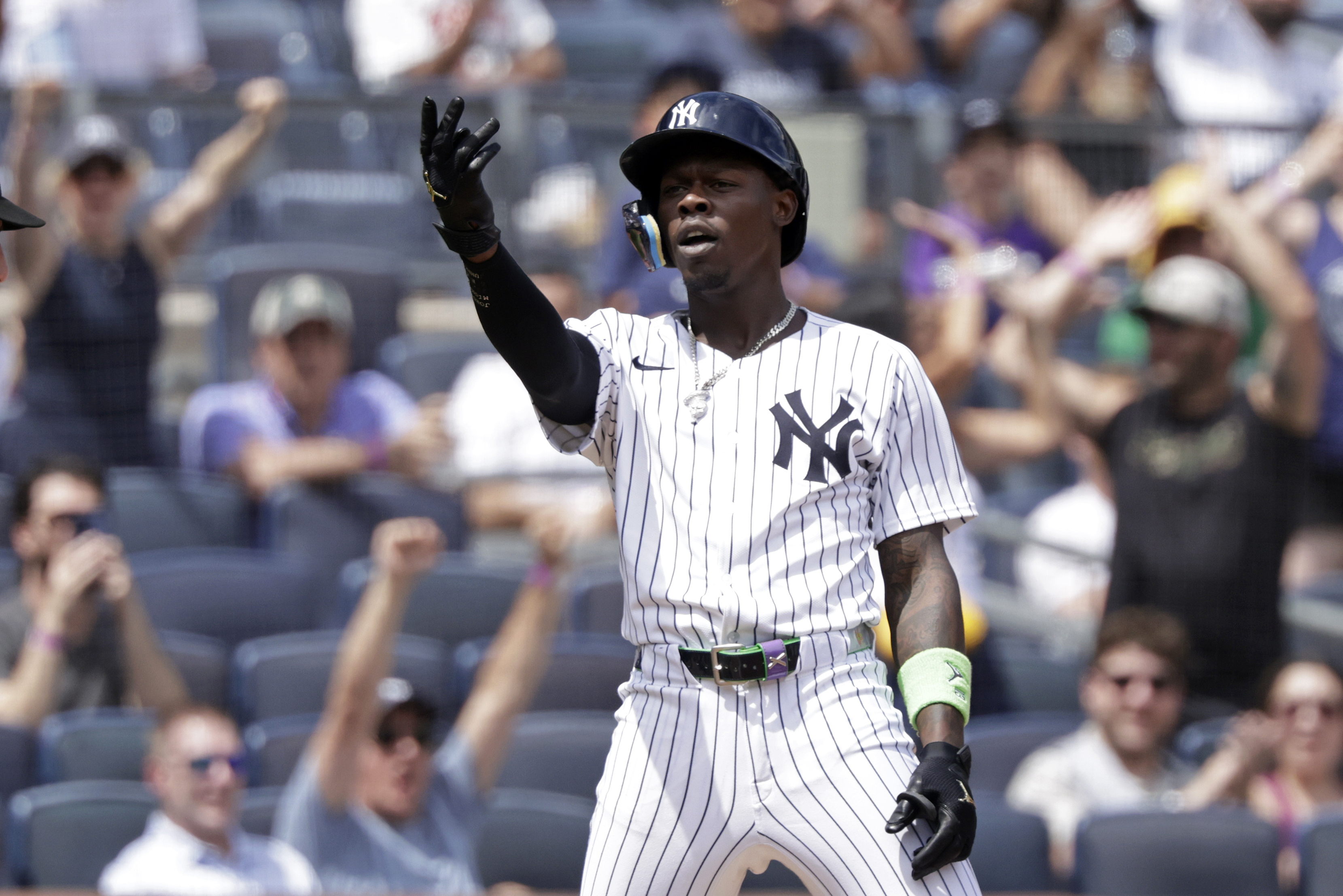 New York Yankees' Jazz Chisholm Jr. reacts after hitting a three-run scoring triple during the third inning of a baseball game against the Athletics, Sunday, June 29, 2025, in New York.