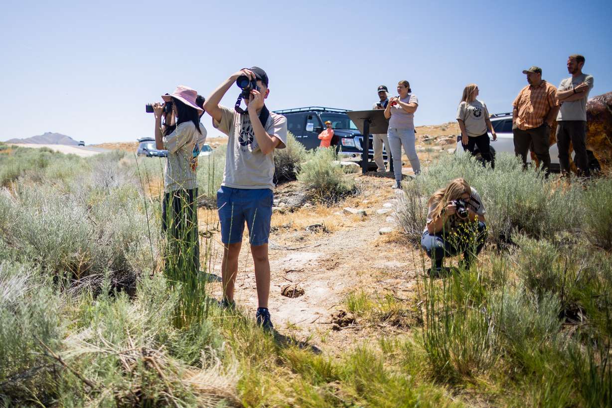 Students take photos during “Lessons Through the Lens: Kids for Conservation,” a Utah Wildlife Federation summer photography camp over four Saturdays for youth ages 12–18 at Antelope Island State Park in Syracuse on Saturday.