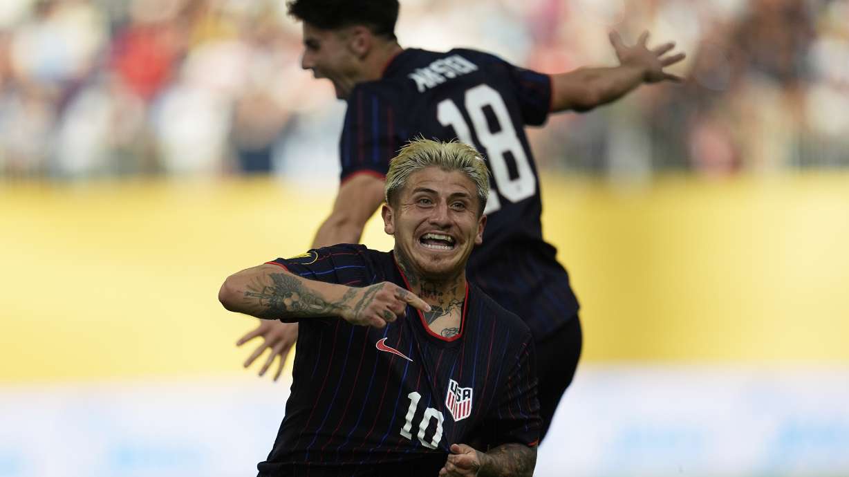 United States midfielder Diego Angel Luna (10) celebrates next to midfielder Maximilian Michael Arfsten (18) after scoring during the first half of a CONCACAF Gold Cup quarterfinals soccer match against Costa Rica, Sunday, June 29, 2025, in Minneapolis.