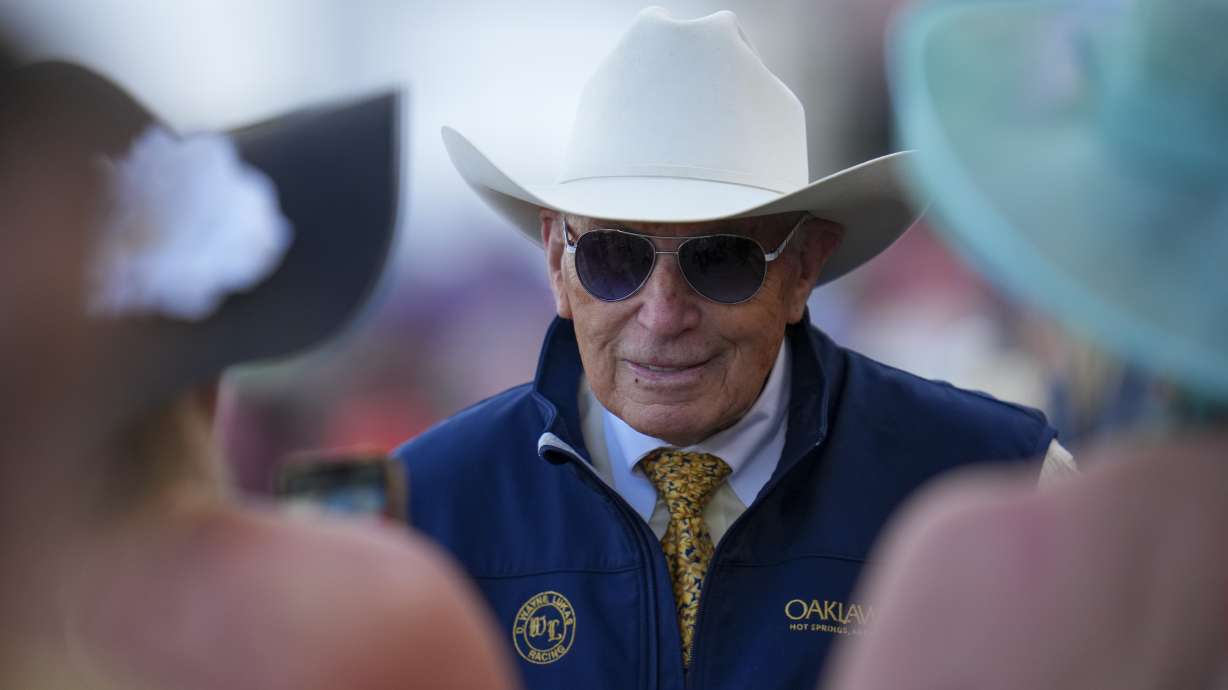 FILE - American Promise trainer D. Wayne Lukas looks on prior to the 150th running of the Preakness Stakes horse race, May 17, 2025, at Pimlico Race Course in Baltimore.