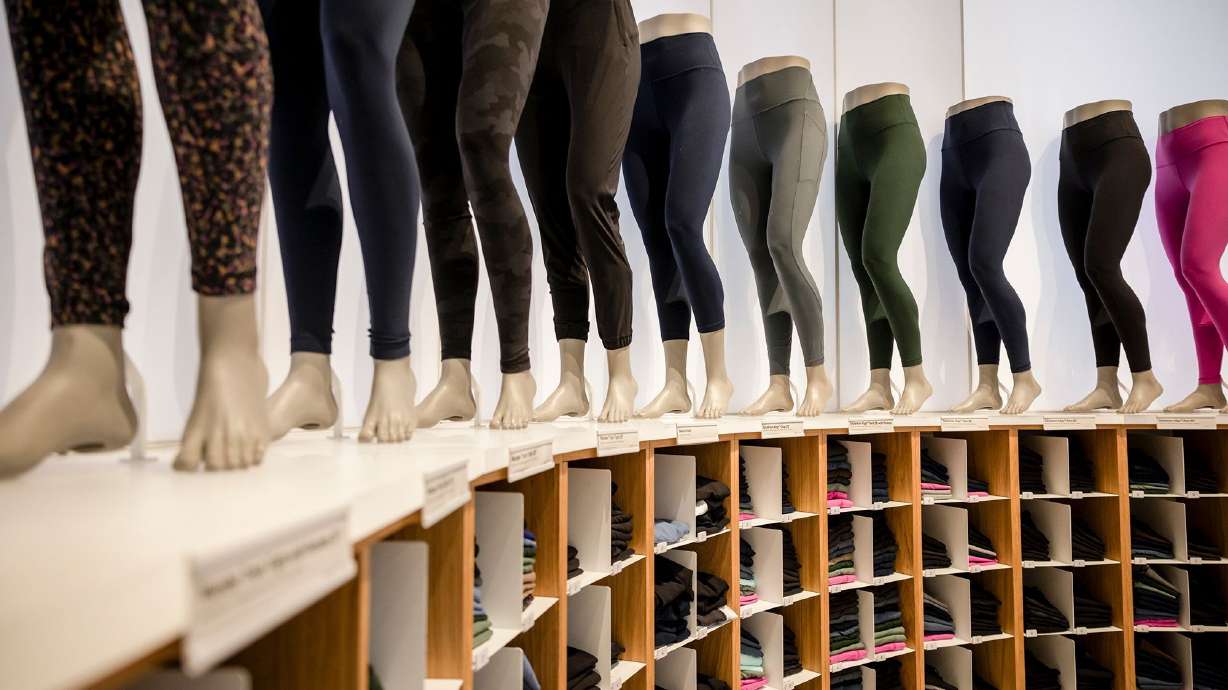 A Lululemon store displaying pants. Lululemon is suing Costco, alleging that the discount wholesaler is selling knockoffs of its $128 pants.