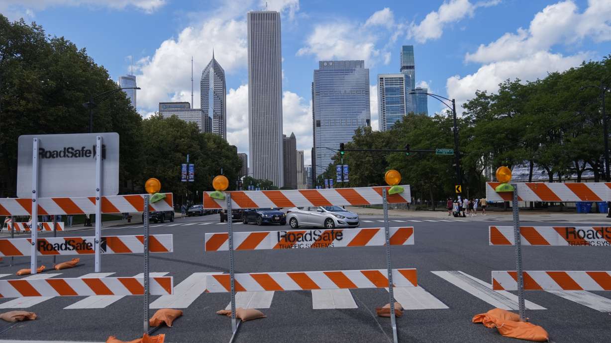 Construction of the street course continues ahead of the NASCAR auto racs, Friday, June 27, 2025, in downtown Chicago.