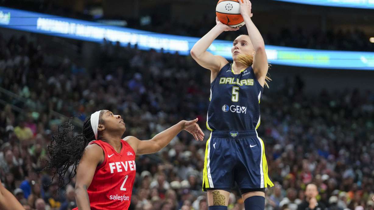 Dallas Wings guard Paige Bueckers (5) shoots against Indiana Fever guard Aari McDonald (2) during the first half of a WNBA basketball game Friday, June 27, 2025, in Dallas.