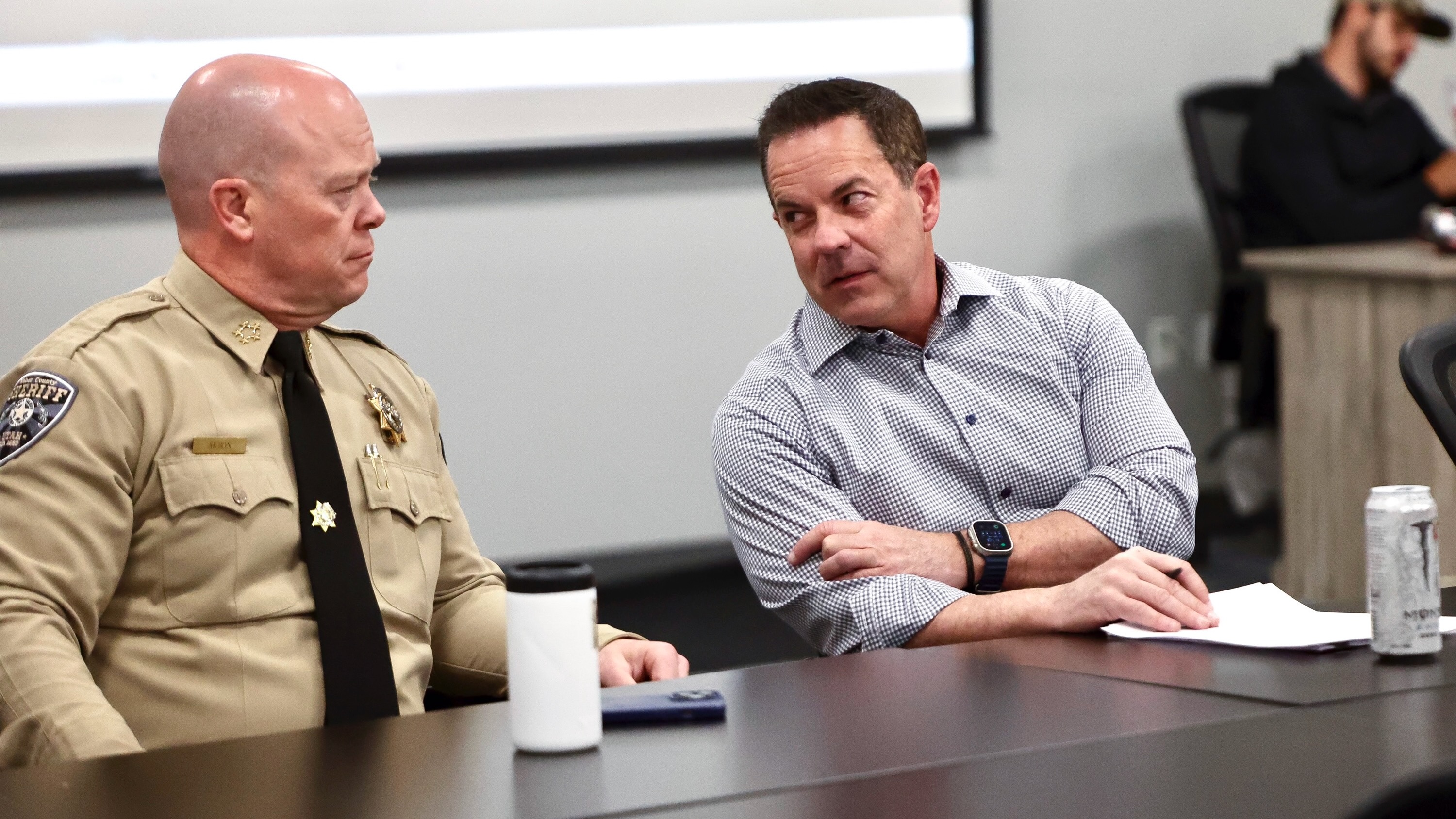 Weber County approved an accord with federal officials to help combat illegal immigration. Sheriff Ryan Arbon talks with Brad Wilson at a press conference in Ogden on May 24, 2024.