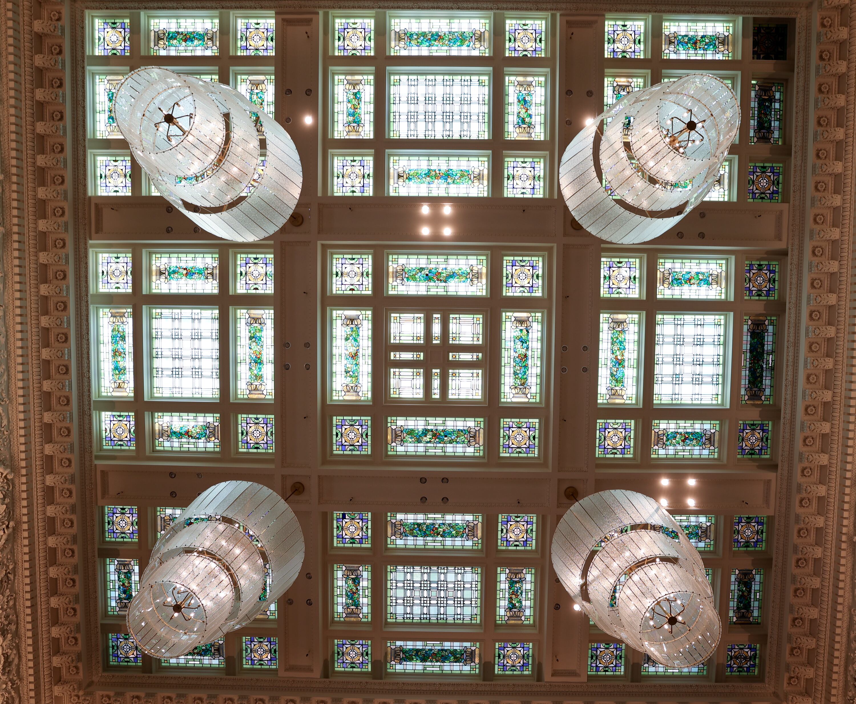 The stained glass ceiling and new chandeliers in the lobby of the Joseph Smith Memorial Building are pictured on the first day it is reopened after a two-and-a-half-year renovation in Salt Lake City on Monday.