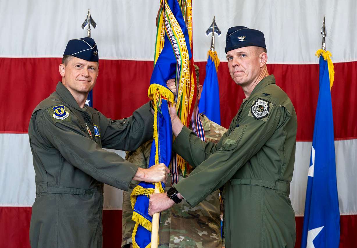 Gen. Brad Lyons poses for photos as he transfers leadership of the 388th Fighter Wing to Col. Charles Fallon during a ceremony at Hill Air Force Base in Ogden on Monday.