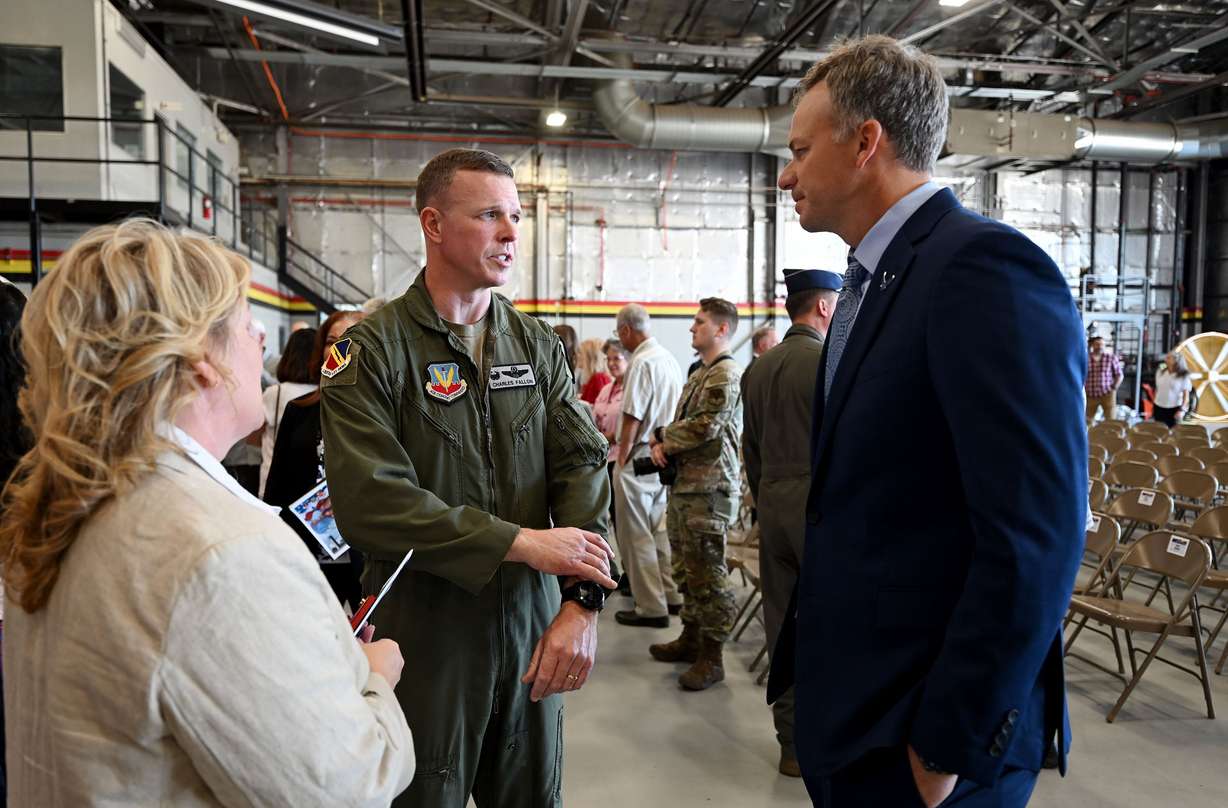 Newly installed commander of the 388th Fighter Wing Col. Charles Fallon talks with Rep. Blake Moore, R-Utah, following a ceremony at Hill Air Force Base in Ogden on Monday.