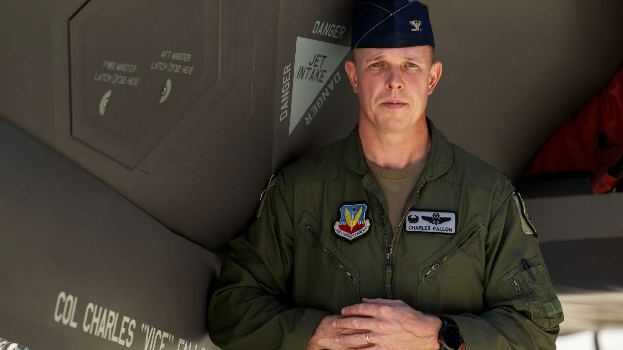 Newly installed commander of the 388th Fighter Wing Col. Charles Fallon poses for a photo with an F-35 bearing his name following a ceremony at Hill Air Force Base in Ogden on Monday.