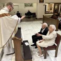 After nearly 75 years of marriage, couple renew vows at St. George Catholic Church