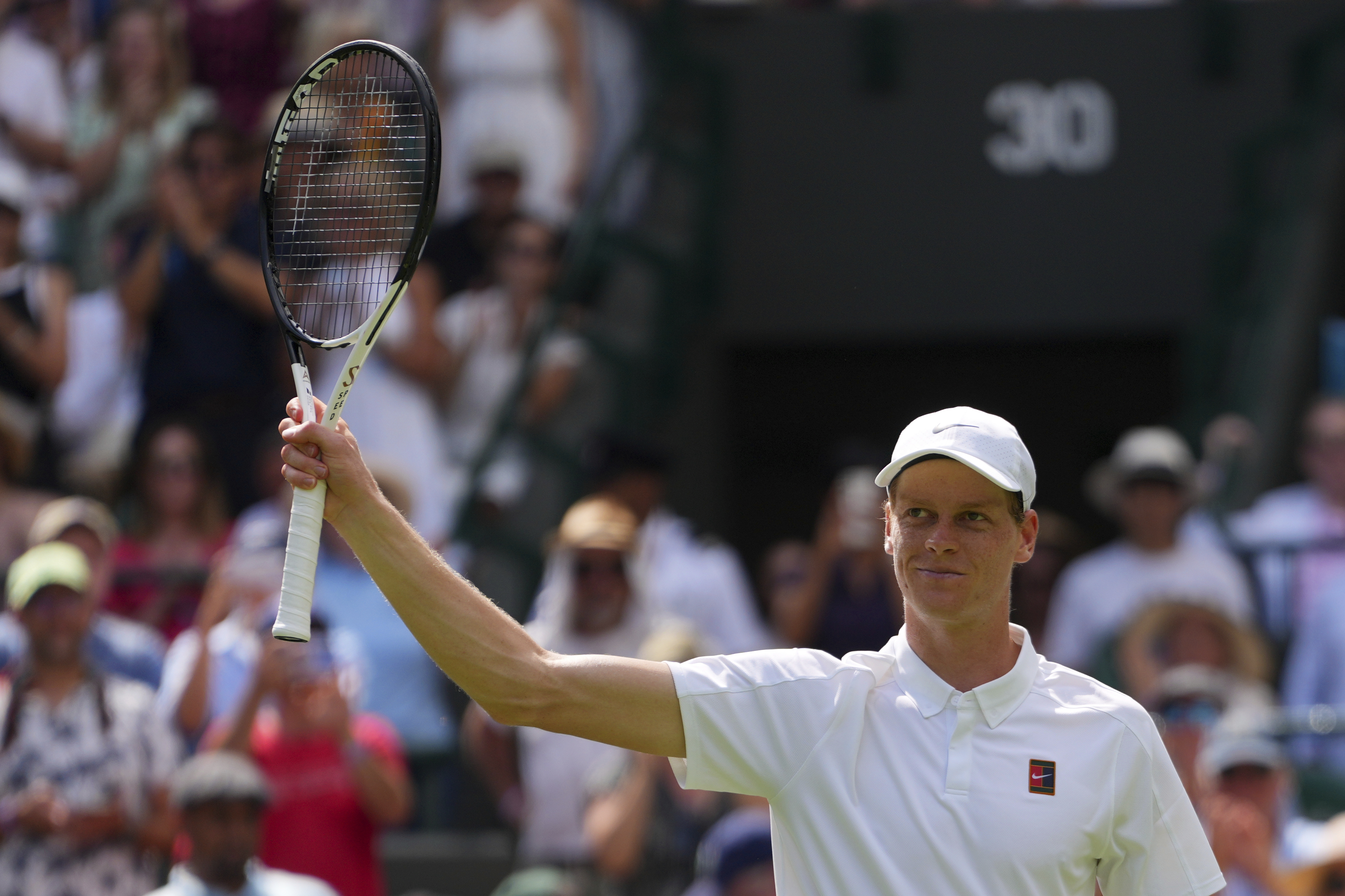 Jannik Sinner of Italy celebrates winning his first round men's singles match against Luca Nardi of Italy during at the Wimbledon Tennis Championships in London, Tuesday, July 1, 2025.