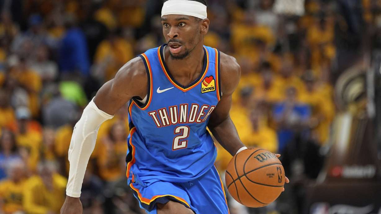 Oklahoma City Thunder guard Shai Gilgeous-Alexander (2) moves the ball up court against the Indiana Pacers during the second half of Game 6 of the NBA Finals basketball series, Thursday, June 19, 2025, in Indianapolis.