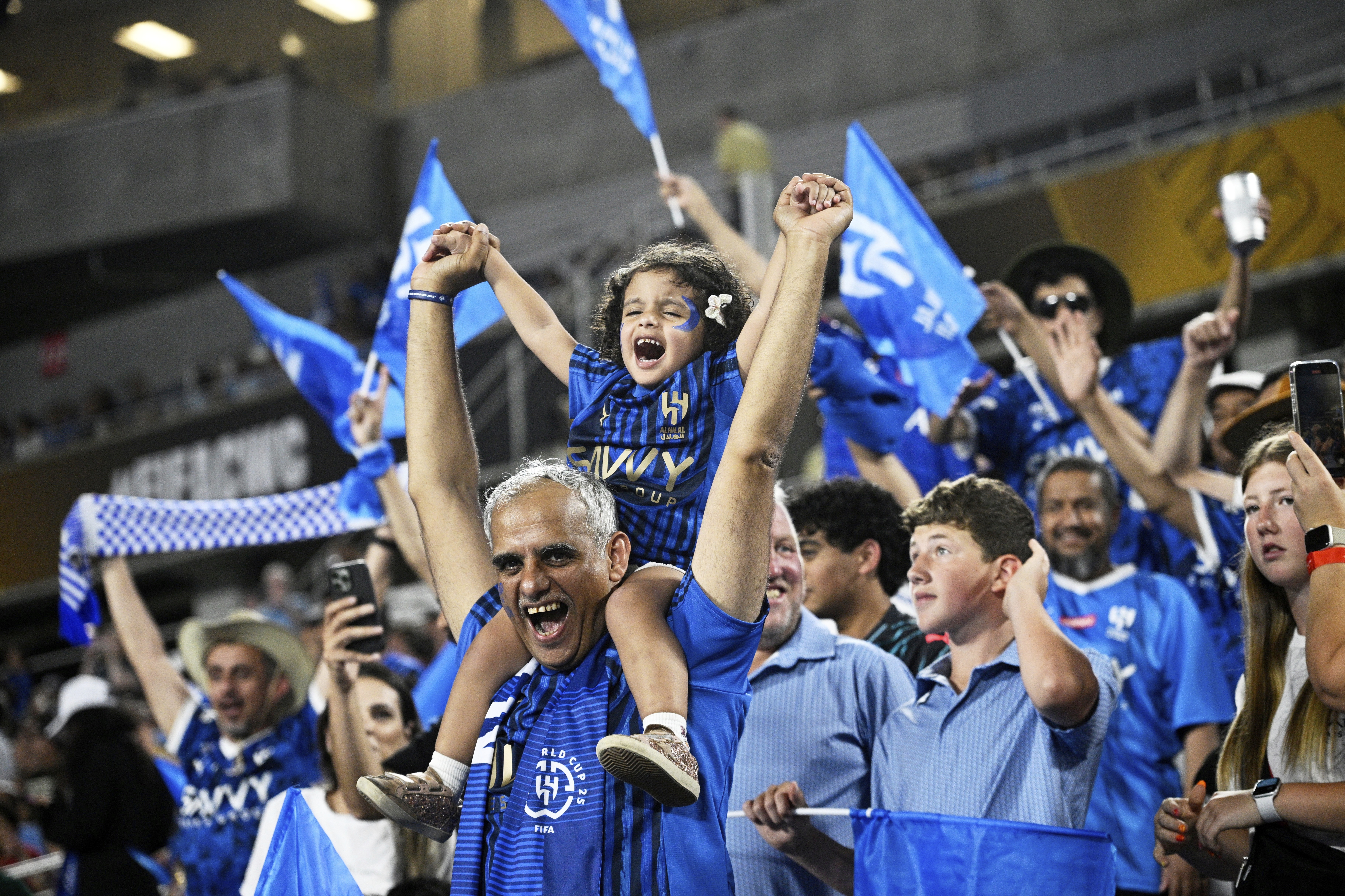 Fans cheer before the Club World Cup round of 16 soccer match between Manchester City and Al Hilal in Orlando, Fla., Monday, June 30, 2025.