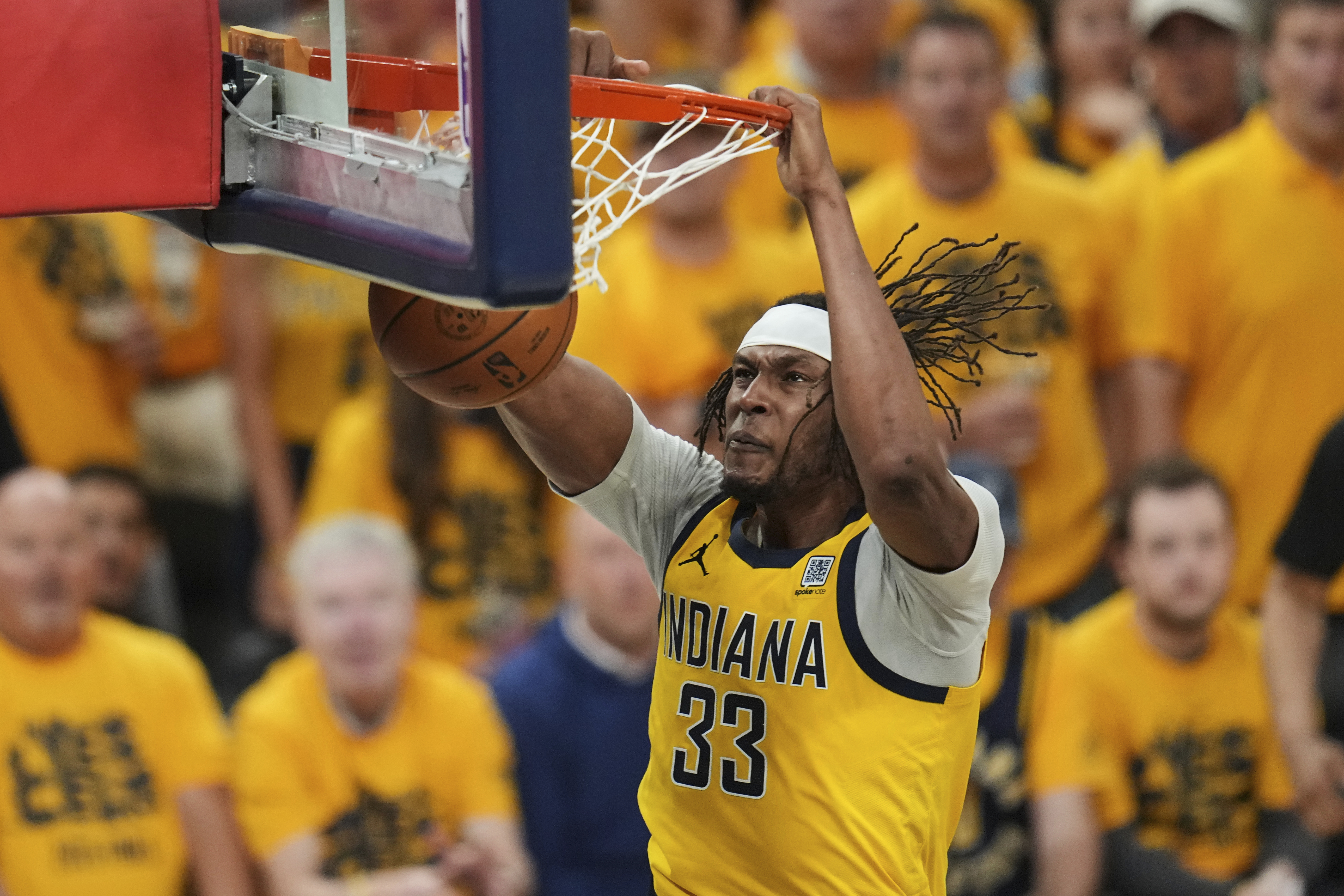 Indiana Pacers center Myles Turner dunks against the Oklahoma City Thunder during the second half of Game 6 of the NBA Finals basketball series, Thursday, June 19, 2025, in Indianapolis. 