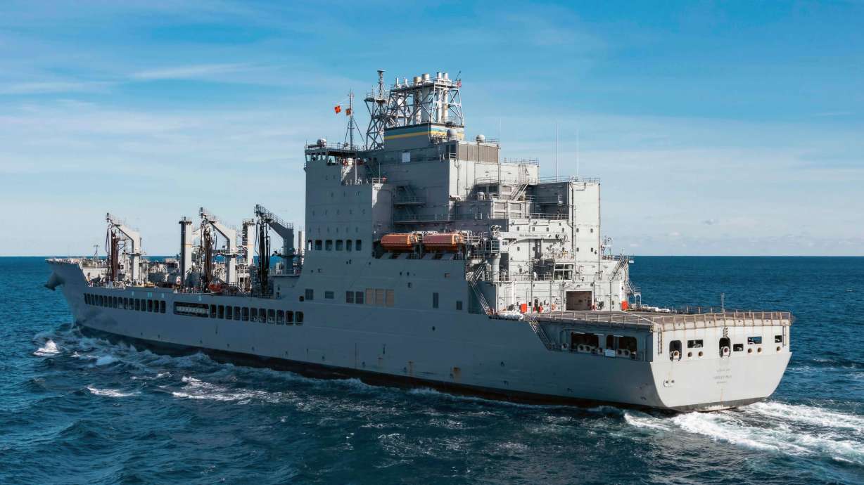 The John Lewis-class replenishment oiler USNS Harvey Milk (T-AO-206) conducts a replenishment in the Atlantic Ocean, Dec. 13, 2024. The tanker was renamed the USNS Oscar V. Peterson on Tuesday.