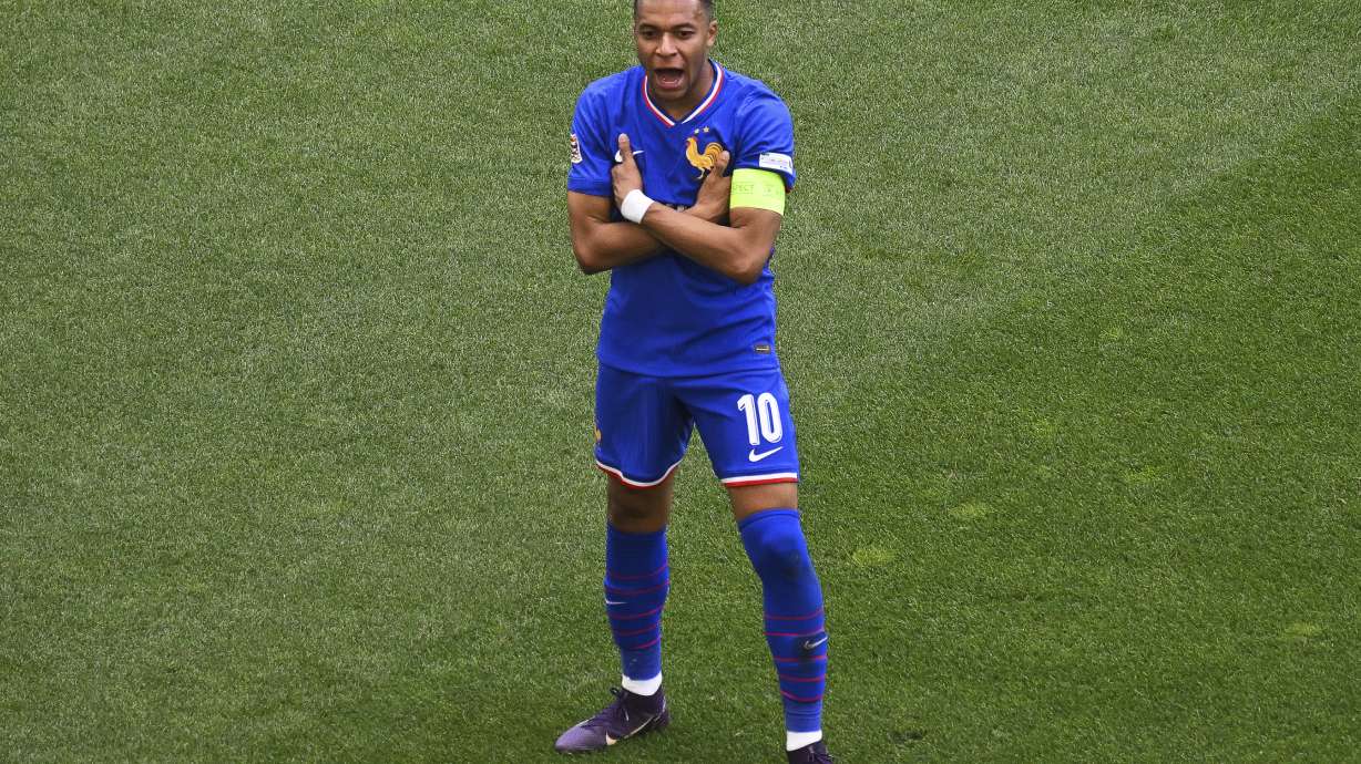 France's Kylian Mbappe celebrates after scoring the opening goal during the Nations League third place soccer match between Germany and France in Stuttgart, Germany, Sunday, June 8, 2025.