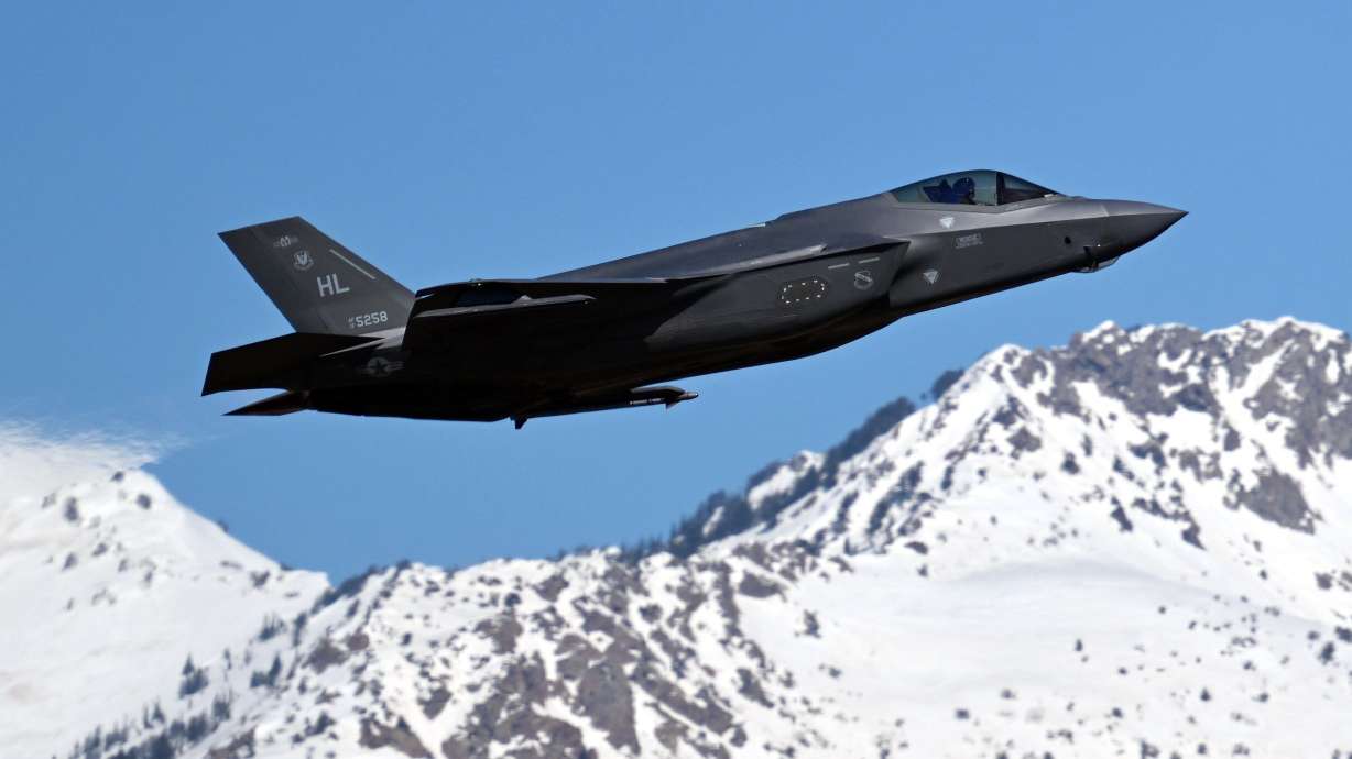 An F-35A Lightning II jet passes the field at Hill Air Force Base in Ogden on March 19, 2024. Pilots will fly over multiple cities across Utah, starting at West Point and ending at Park City, on Friday.