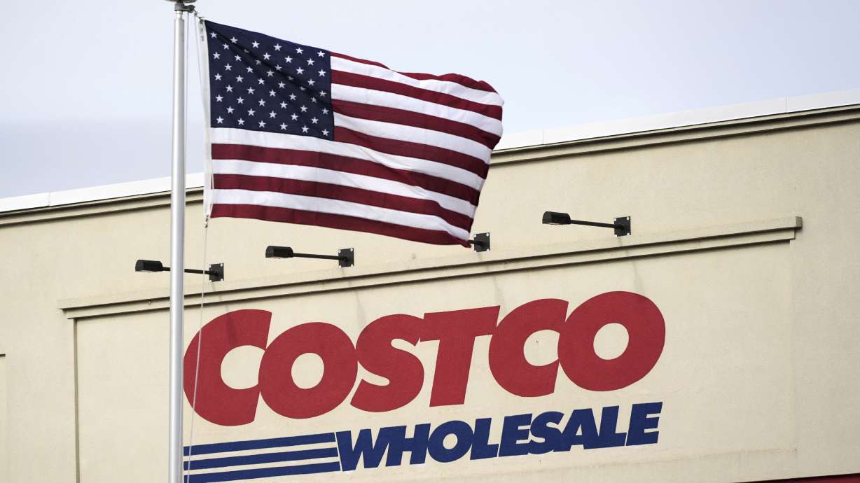 An American flag flies outside a Costco Warehouse in Cranberry, Pa., on March 7.