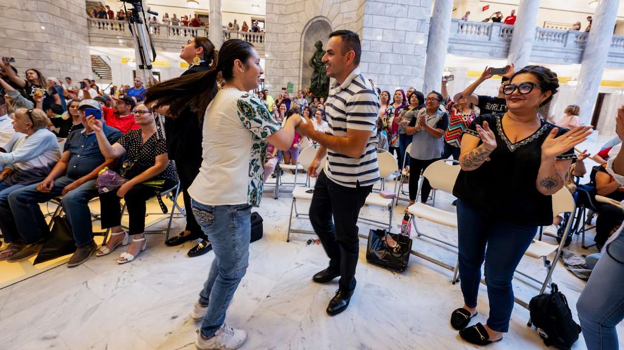 Latinos motored growth in Utah between 2023 and 2024, according to new population estimates. In this Aug. 30, 2023, photo, people dance to mariachi music at the state Capitol in Salt Lake City.