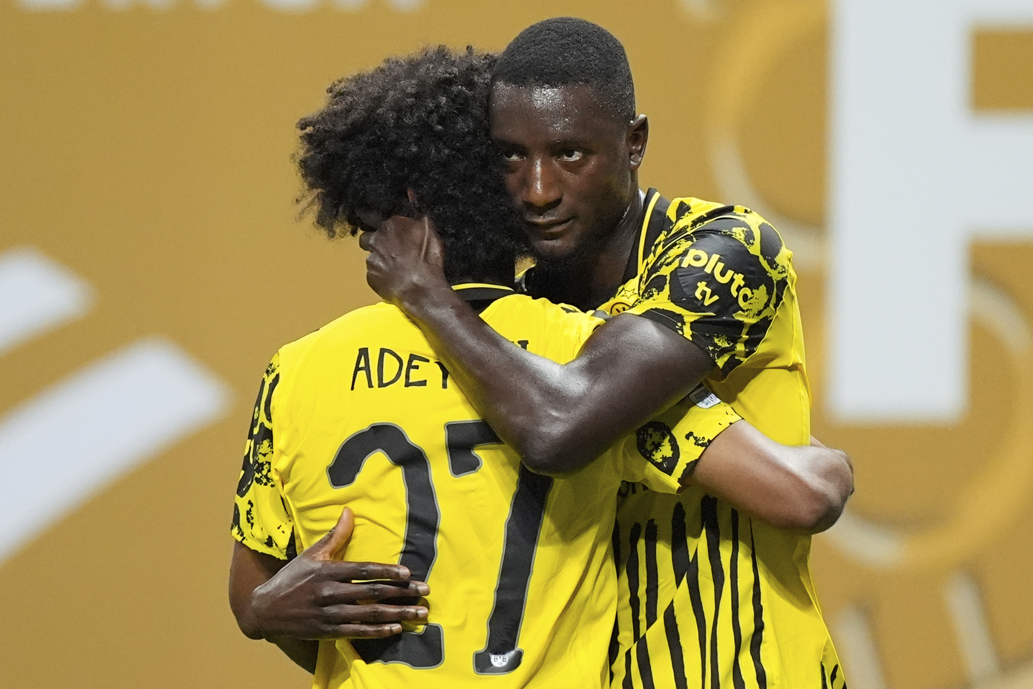 Borussia Dortmund's Serhou Guirassy, right, celebrates with teammate Karim Adeyemi after scoring his team's second goal during the Club World Cup round of 16 soccer match between Borussia Dortmund and CF Monterrey in Atlanta, Tuesday, July 1, 2025. 