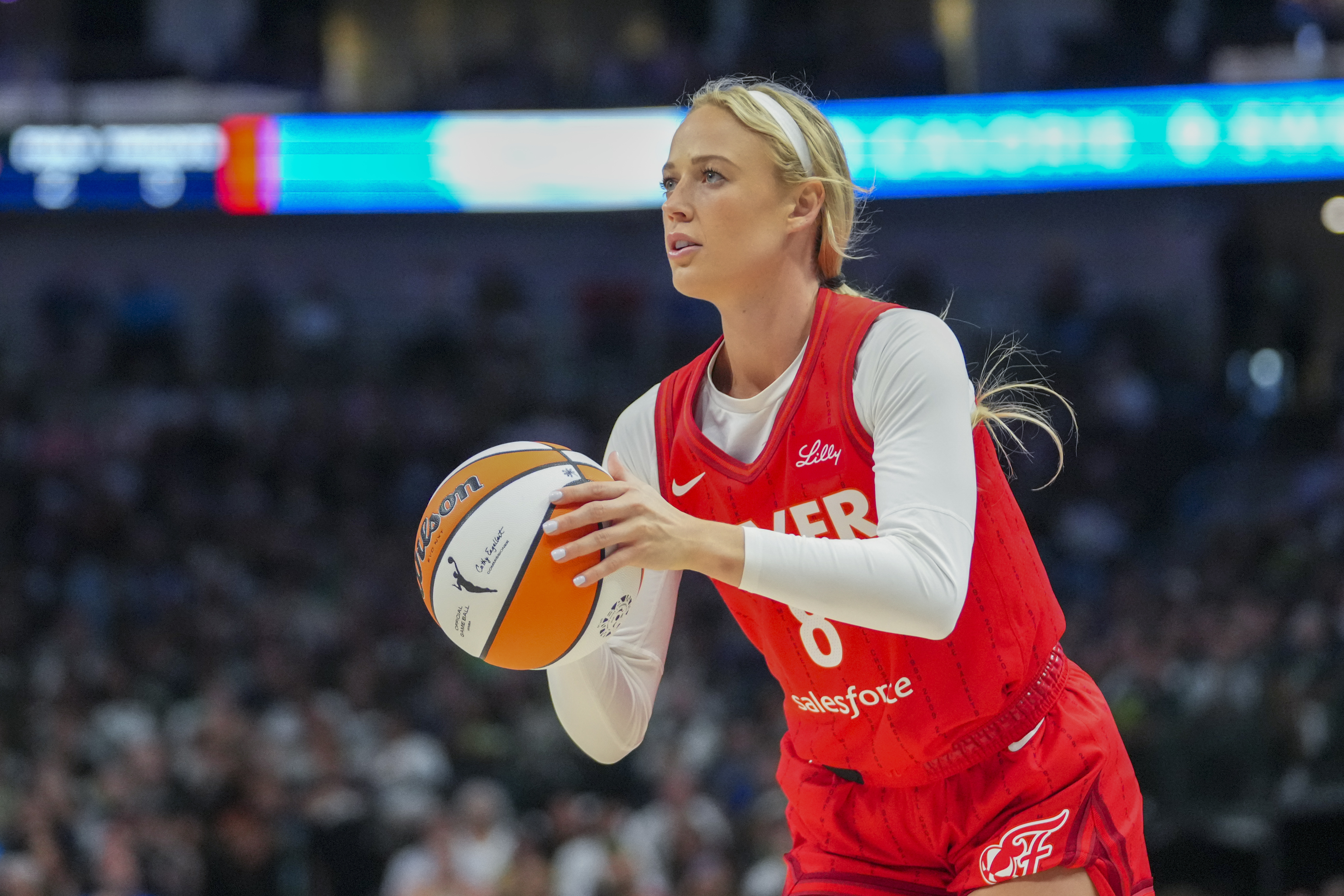 Indiana Fever guard Sophie Cunningham prepares to shoot against the Dallas Wings during the first half of a WNBA basketball game Friday, June 27, 2025, in Dallas.