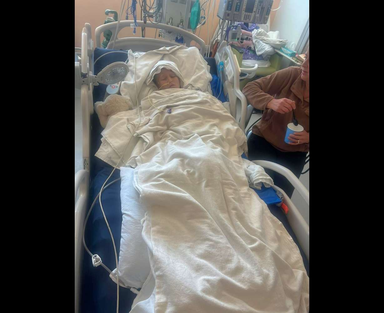 Zoe Kartchner, of Idaho, is shown recovering at Primary Children's Hospital in Salt Lake City after an infection spread throughout her body.