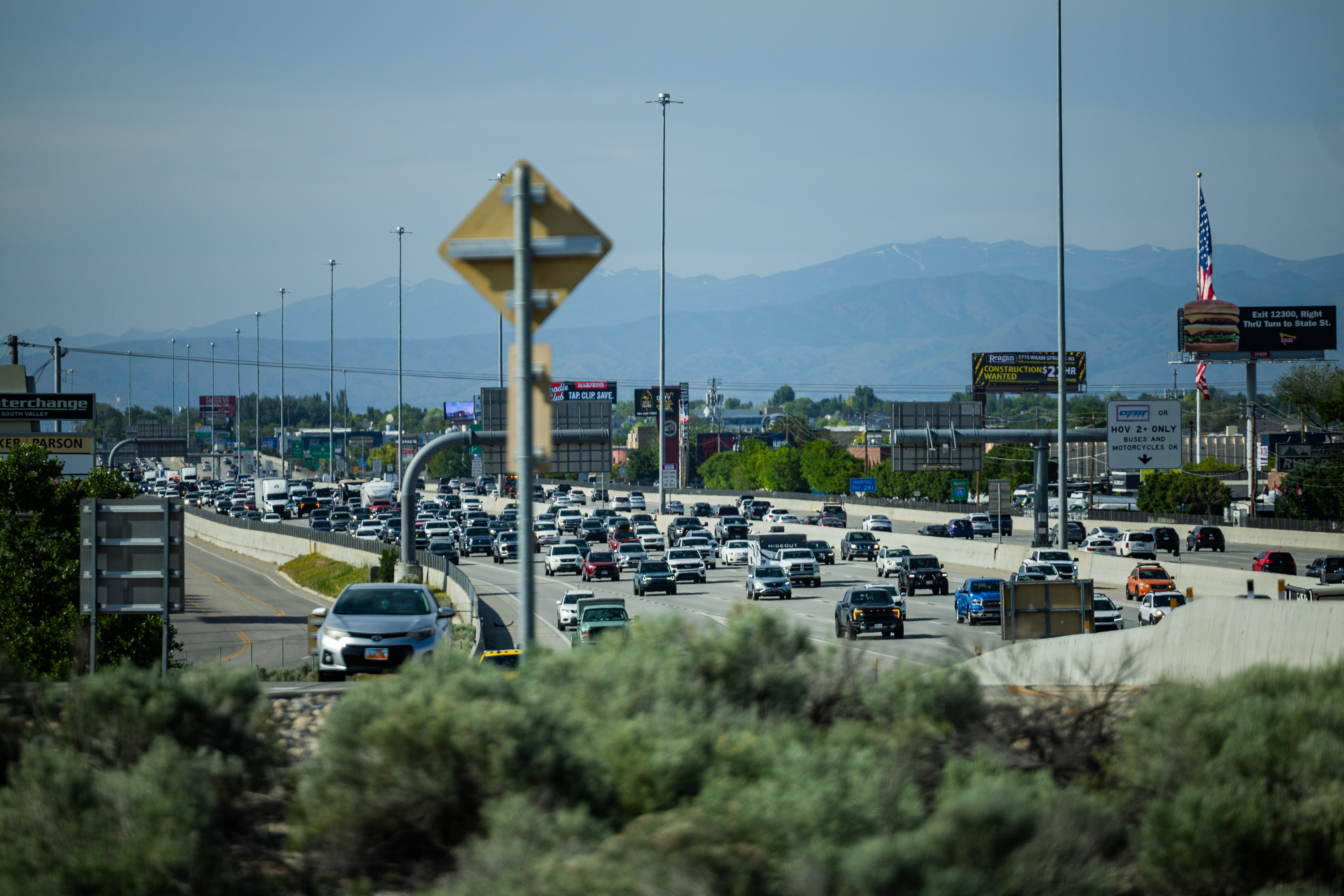 Traffic moves along northbound I-15 in Draper on May 23. Experts believe this Independence Day weekend could break travel records, but it could also lead to some travel headaches.