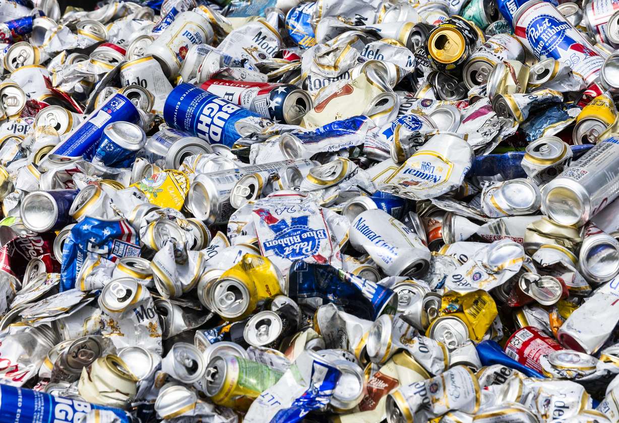 A pile of 11,440 aluminum cans is used to visualize the more than 11,400 DUI arrests made in 2024 at a Utah Department of Public Safety press conference warning Utahns of the dangers of drunk driving, at the Calvin Rampton Complex in Taylorsville on Wednesday.