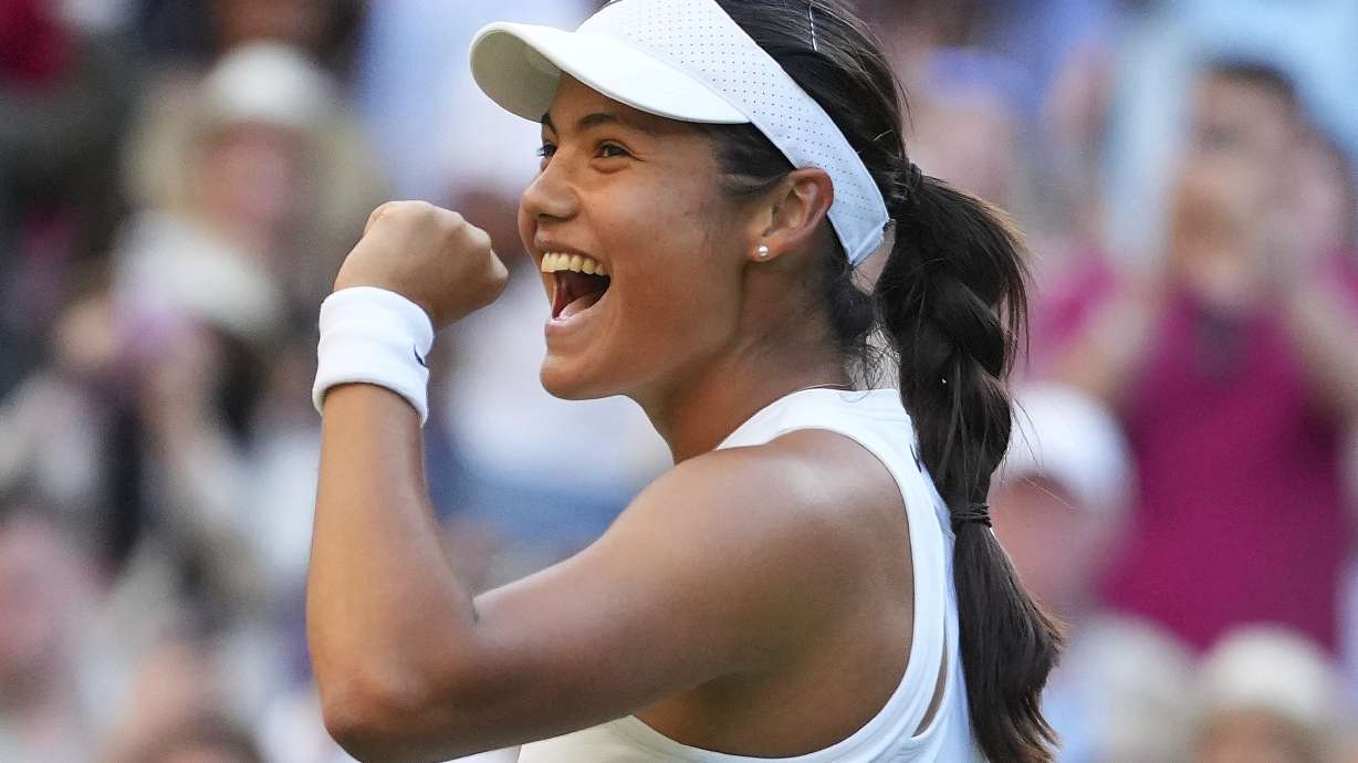 Emma Raducanu of Britain celebrates winning the second round women's singles match against Marketa Vondrousova of the Czech Republic at the Wimbledon Tennis Championships in London, Wednesday, July 2, 2025.
