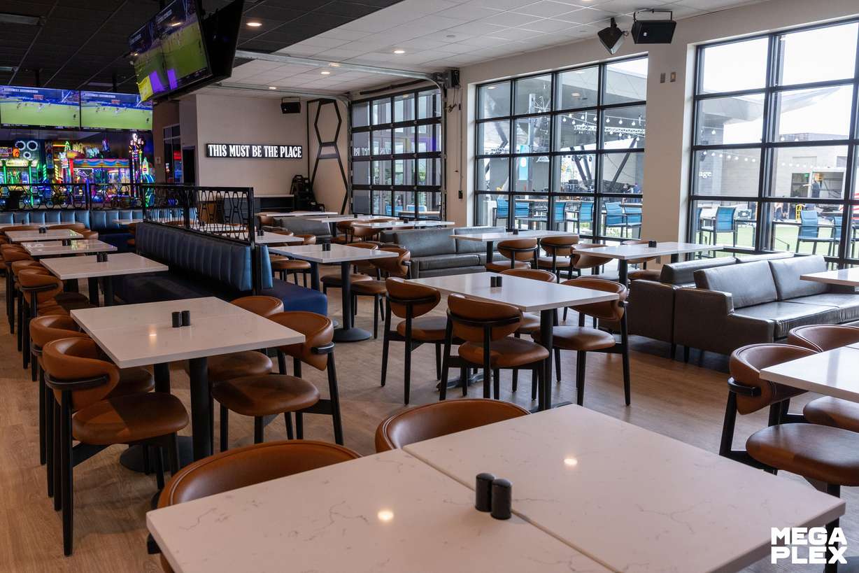 The entertainment offerings around America First Square in Daybreak continue to expand with Larry H. Miller Megaplex on Wednesday opening its first-of-a-kind cinema entertainment center.