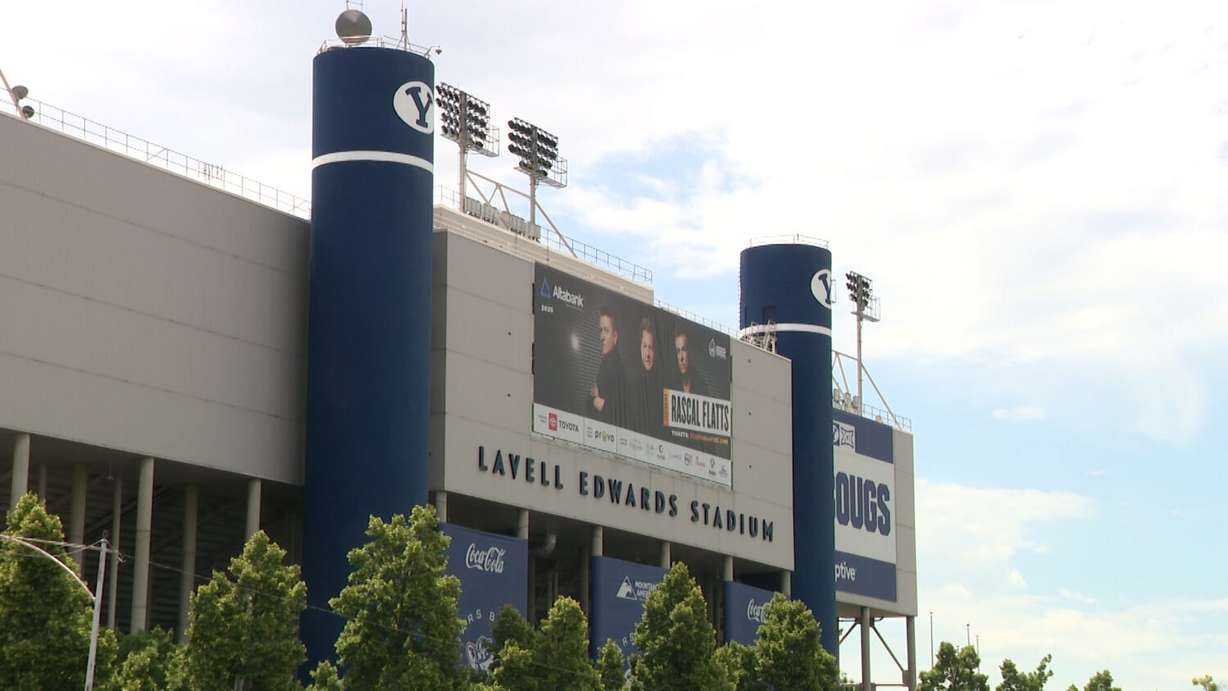 A banner advertising the 2025 Stadium of Fire hangs on LaVell Edwards Stadium in Provo on Wednesday. Organizers are taking steps to prevent another fireworks fiasco like last year's incident that injured 26 people.