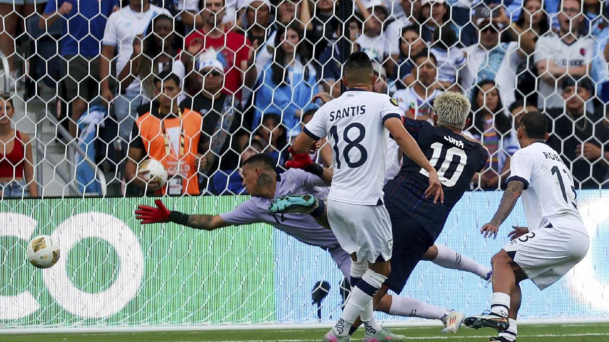 United States midfielder Diego Luna (10) scores a goal past Guatemala goalkeeper Kenderson Navarrol, left, during the first half of a CONCACAF Gold Cup semifinal soccer match, Wednesday, July 2, 2025, in St. Louis.