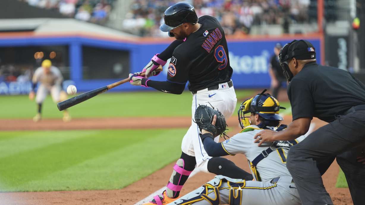 New York Mets' Brandon Nimmo (9) hits a grand slam during the second inning in the second baseball game of a doubleheader against the Milwaukee Brewers Wednesday, July 2, 2025, in New York.