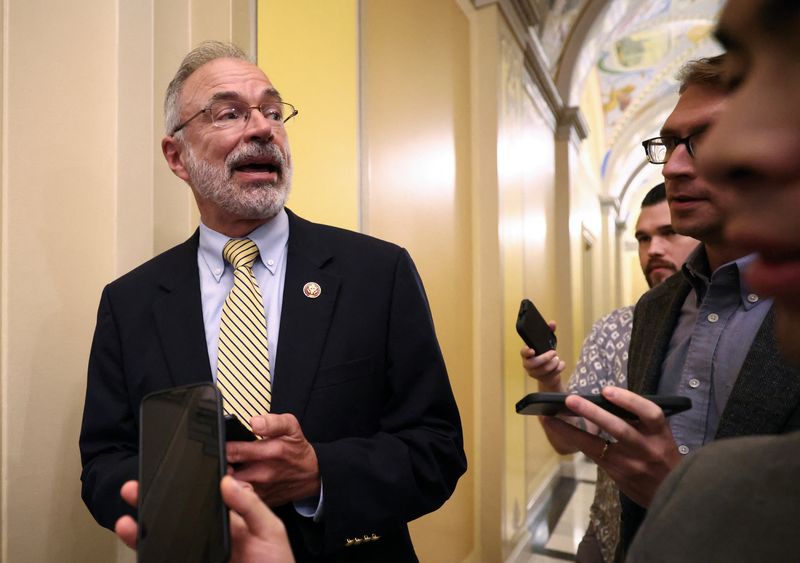 House Freedom Caucus Chair Andy Harris, R-Md., speaks to reporters in Washington, Wednesday. Harris is one of the holdouts against President Donald Trump's tax-cut and spending bill.