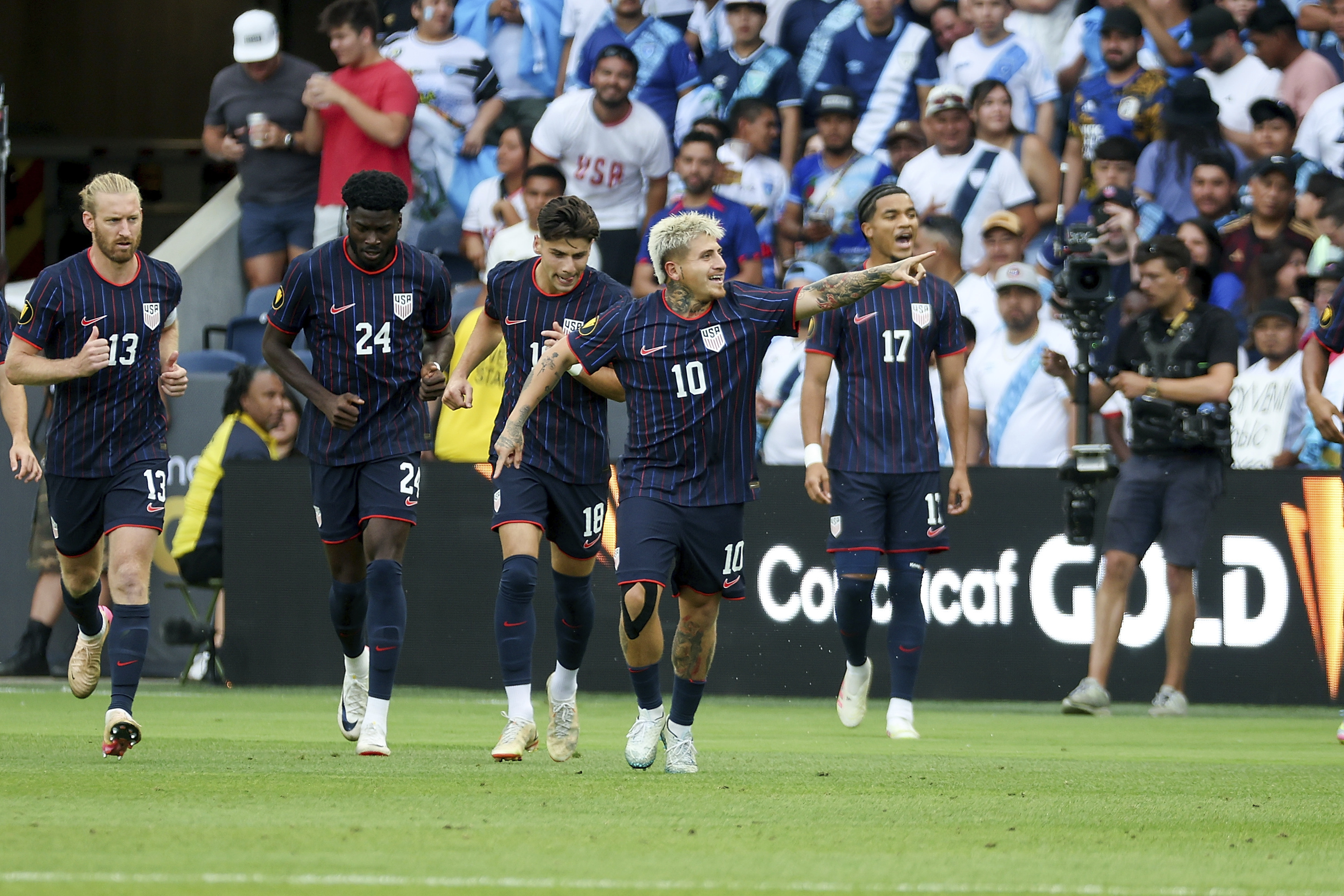 United States midfielder Diego Luna (10) celebrates after scoring a goal during the first half of a CONCACAF Gold Cup semifinal soccer match against Guatemala, Wednesday, July 2, 2025, in St. Louis. 