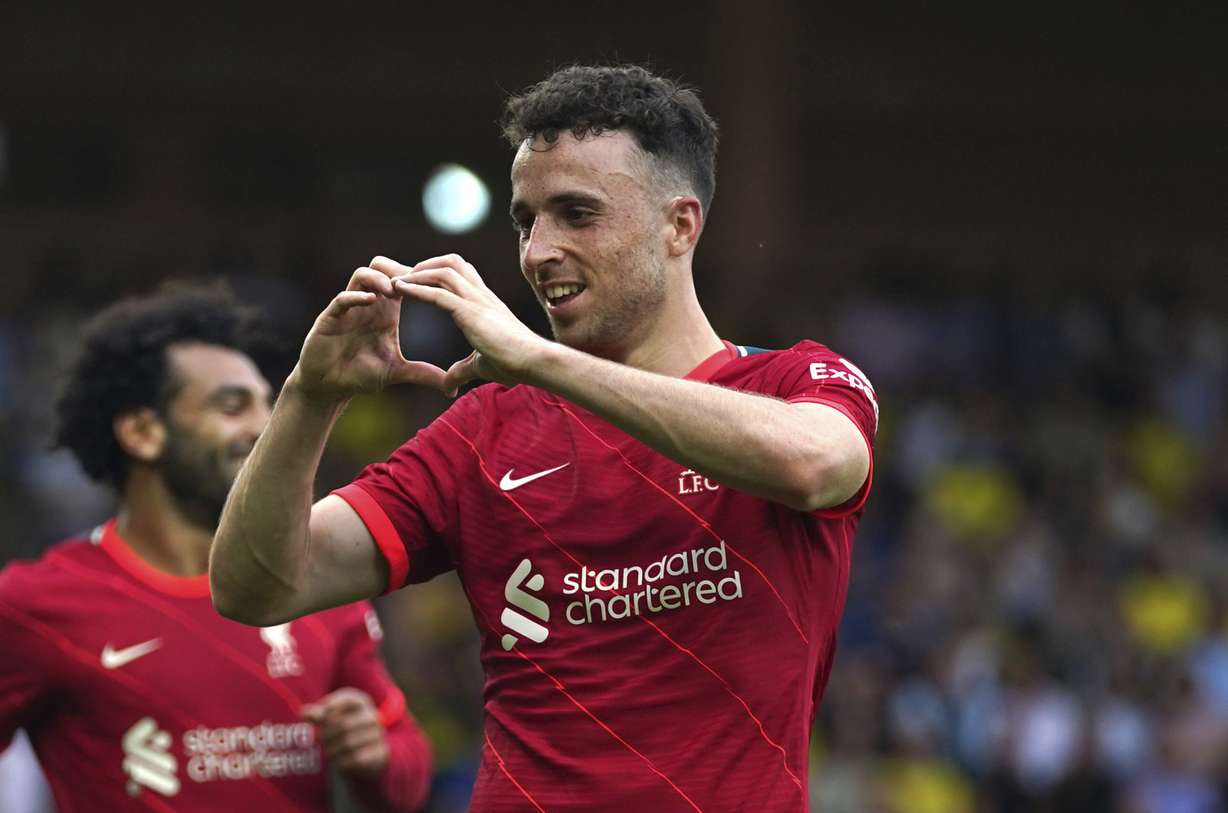 Liverpool's Diogo Jota celebrates scoring during the Premier League match at Carrow Road, Norwich, England Aug. 14, 2021.