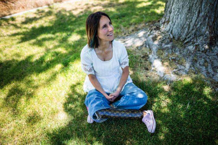 Renee DeHaan, who trekked to Mount Everest base camp this spring on her prosthetic leg, poses at her home in South Jordan on June 7.