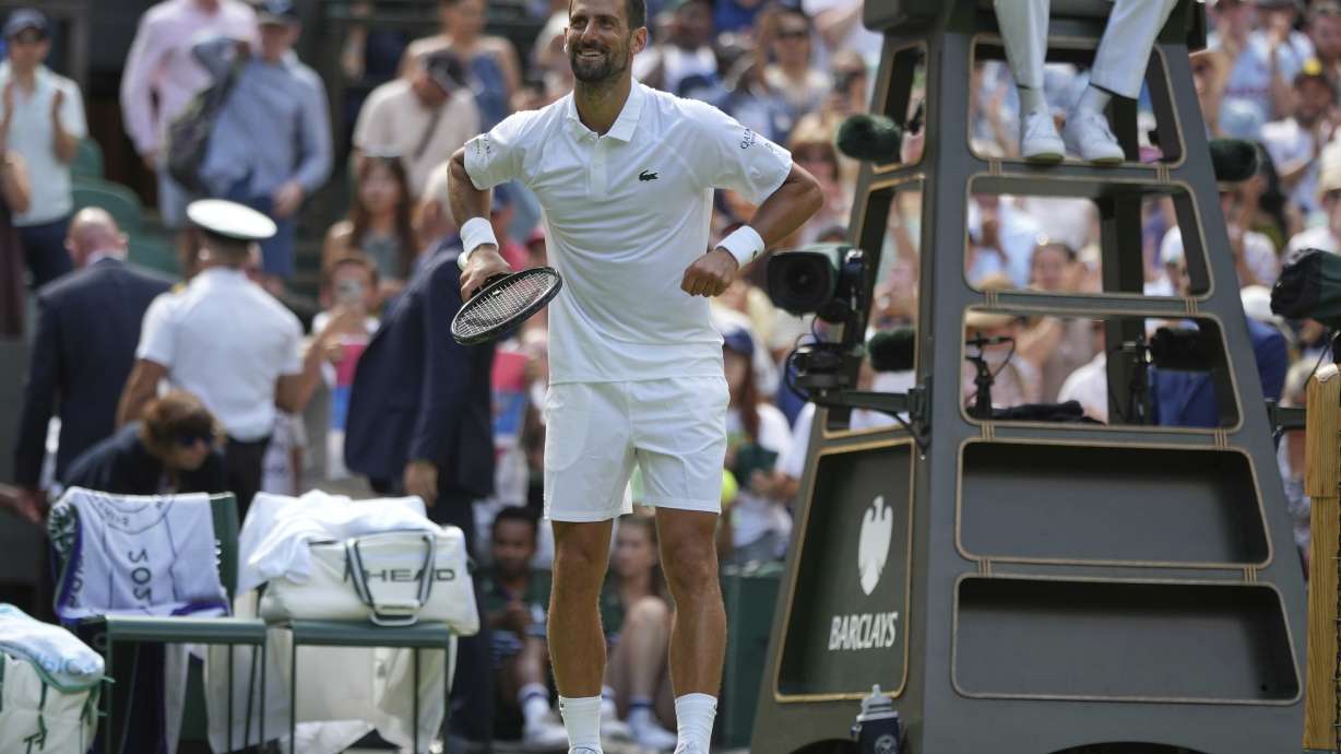 Novak Djokovic of Serbia reacts after beating Daniel Evans of Britain during their second round men's singles match at the Wimbledon Tennis Championships in London, Thursday, July 3, 2025.