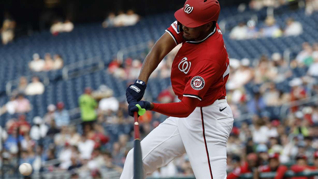 Washington Nationals' James Wood hits a single against Detroit Tigers pitcher Jack Flaherty during the first inning in the second baseball game of a doubleheader in Washington, Wednesday, July 2, 2025.