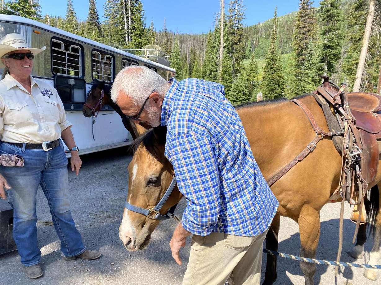 Salt Lake County District Attorney Sim Gill visited Camp Hope, a summer camp for children who are victims or witnesses of crime, funded by the district attorney's office.
