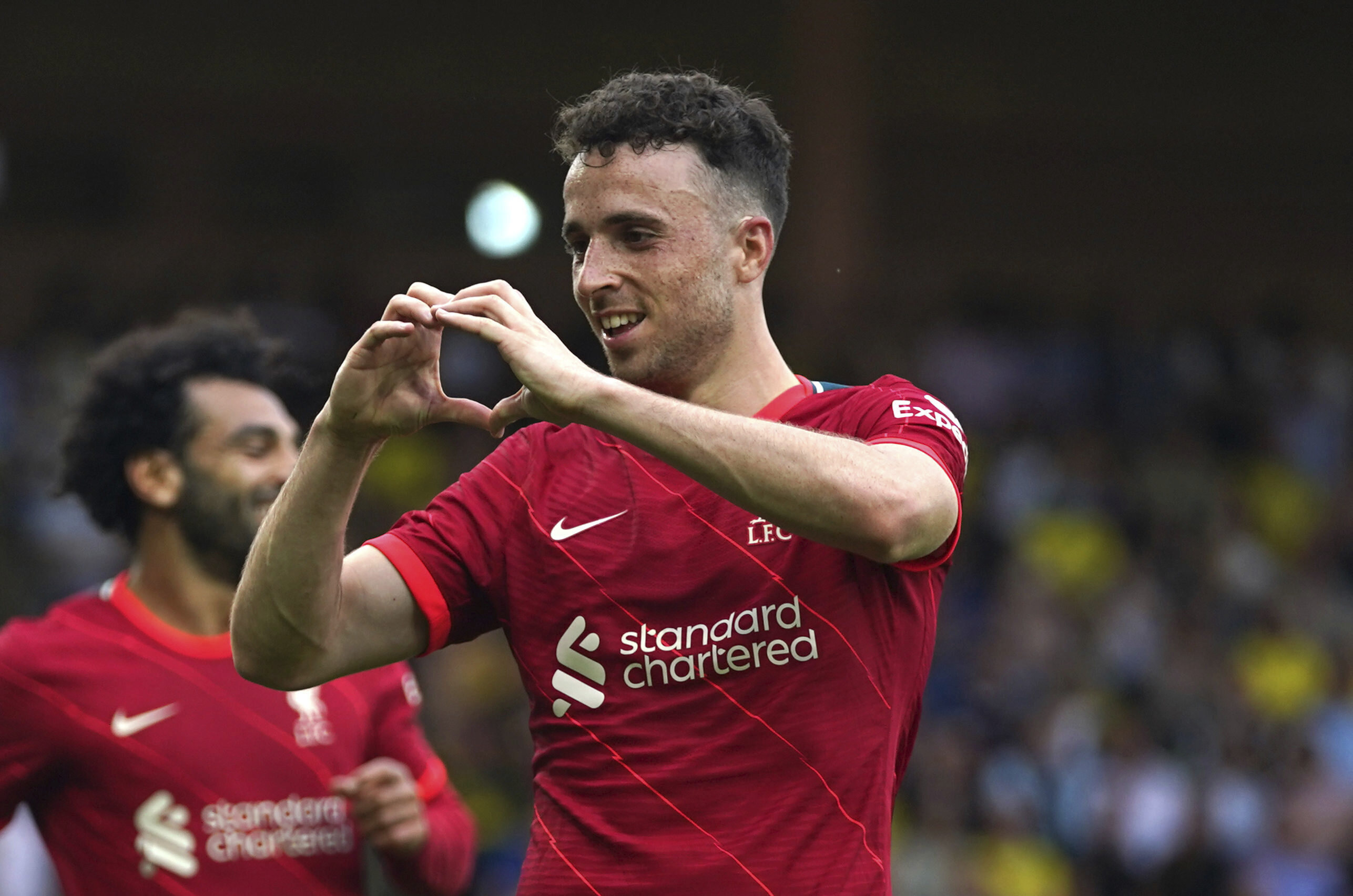 FILE - Liverpool's Diogo Jota celebrates scoring during the Premier League match at Carrow Road, Norwich, Saturday Aug. 14, 2021.