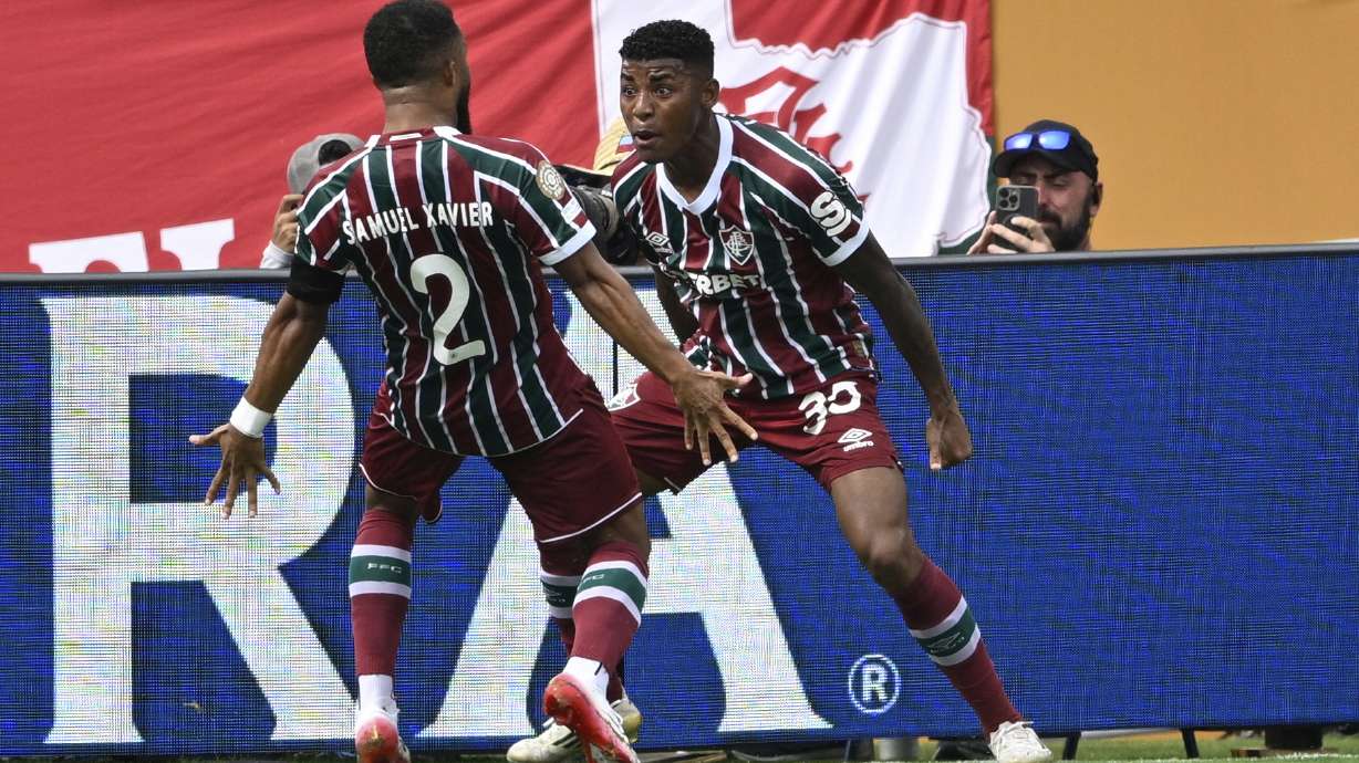 Fluminense's Samuel Xavier, left, and Hercules. celebrate after a goal during the Club World Cup quarterfinal soccer match between Fluminense and Al Hilal in Orlando, Fla., Friday, July 4, 2025.