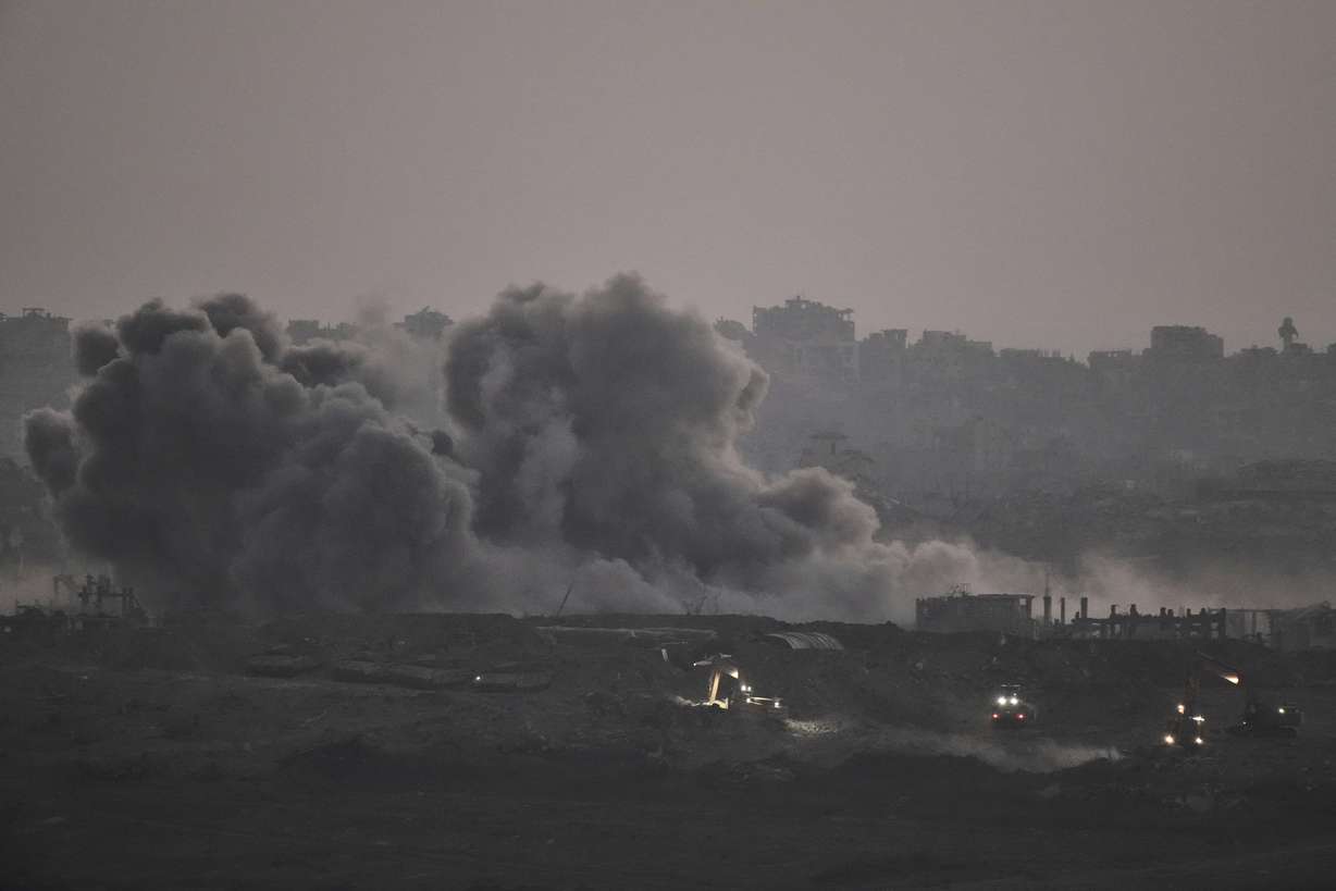 Smoke rises from Israeli bombardment of the Gaza Strip, seen from southern Israel, Thursday. A new ceasefire deal is attempting to bridge some of the differences between Israel and Hamas.