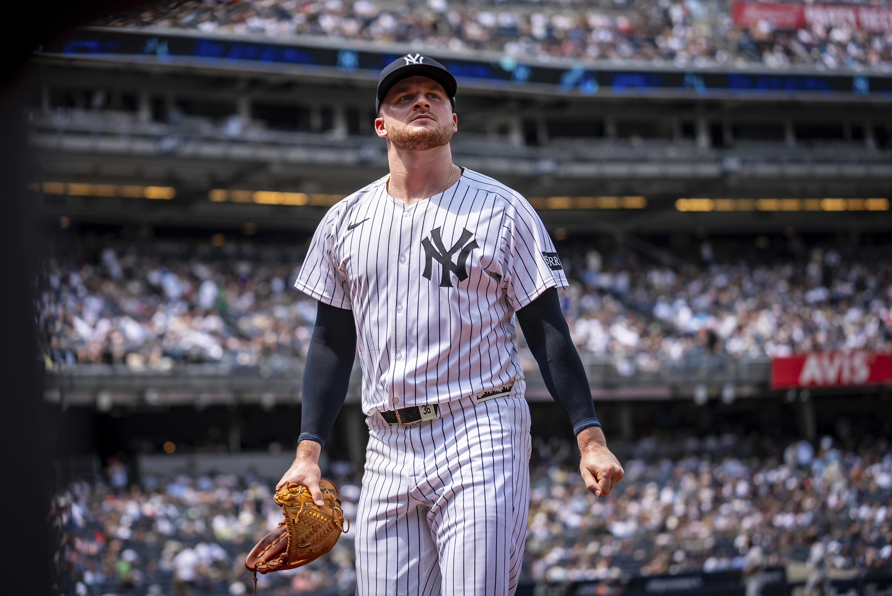 New York Yankees pitcher Clarke Schmidt (36) walks off the field during the fourth inning of a baseball game against the Athletics, Saturday, June 28, 2025, in New York. 