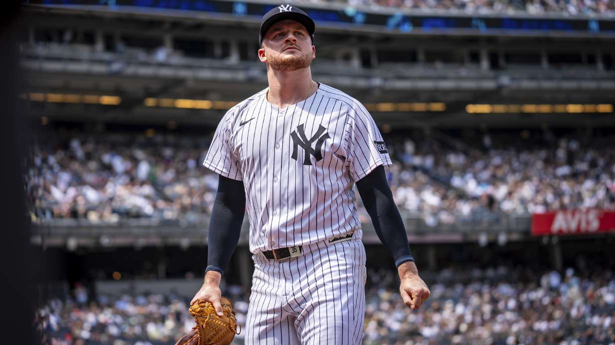 New York Yankees pitcher Clarke Schmidt (36) walks off the field during the fourth inning of a baseball game against the Athletics, Saturday, June 28, 2025, in New York.