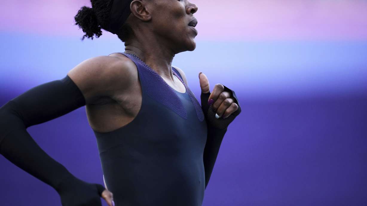 Faith Kipyegon, from Kenya, runs in an attempt to become the first woman to run a mile in under four minutes, at Stade Charlety in Paris, Thursday, June 26, 2025.